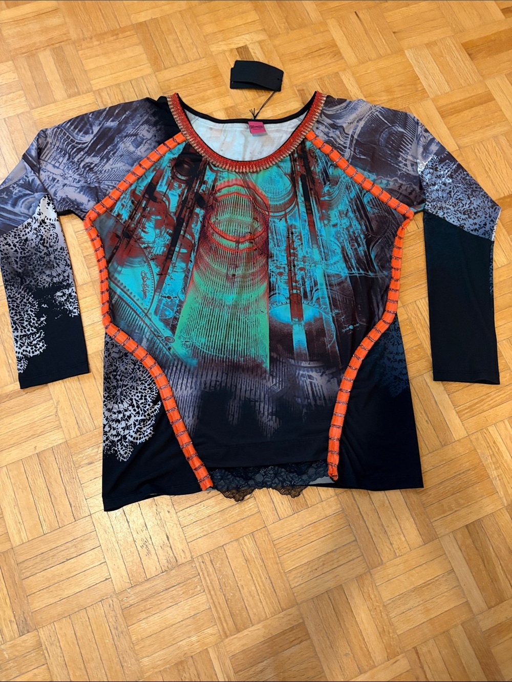 Save the Queen Women’s Abstract Print Long Sleeve Top with Orange Trim